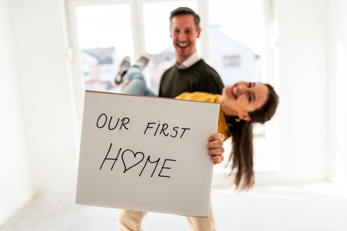 Happy couple celebrating new home
